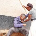 Please Help Me Out: I Have Not Seen Peace Since I Married My Wife” — Man Cries Out As Wife Is Seen Punching Him Mercilessly Net-picture-of-a-man-being-beaten-by-a-woman